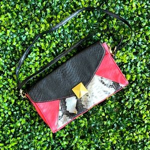 Cosmopolitan Pink And Black Snakeskin Handbag